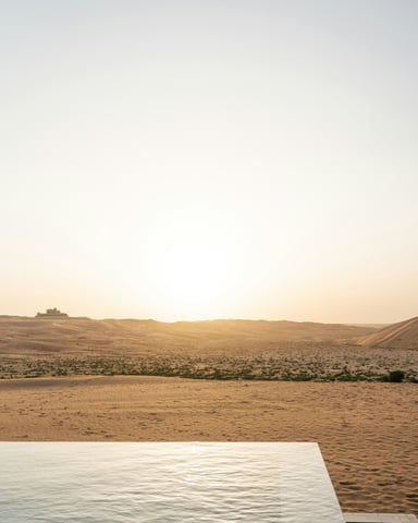 Desert pool at sunrise