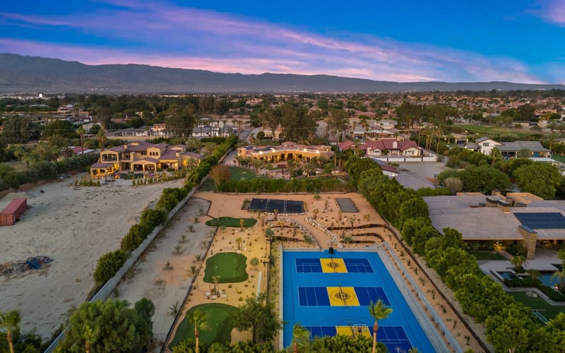 California Desert estate and mountain horizon at dusk