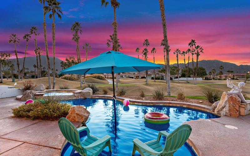 PGA West pool at sunset with mountain views